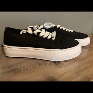 Bamboo platform sneakers, black with white soles. Never been worn.